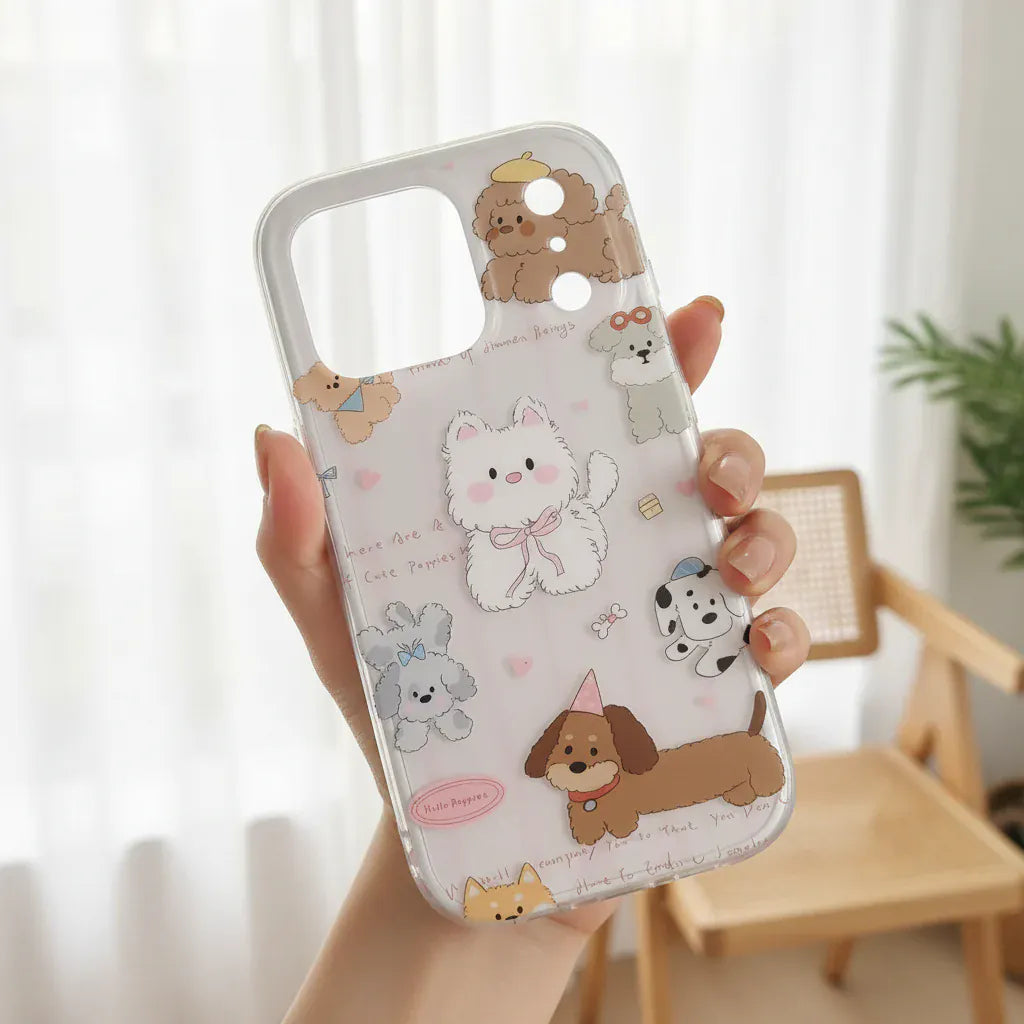 Phone case with cartoon dog designs held by a person outdoors.