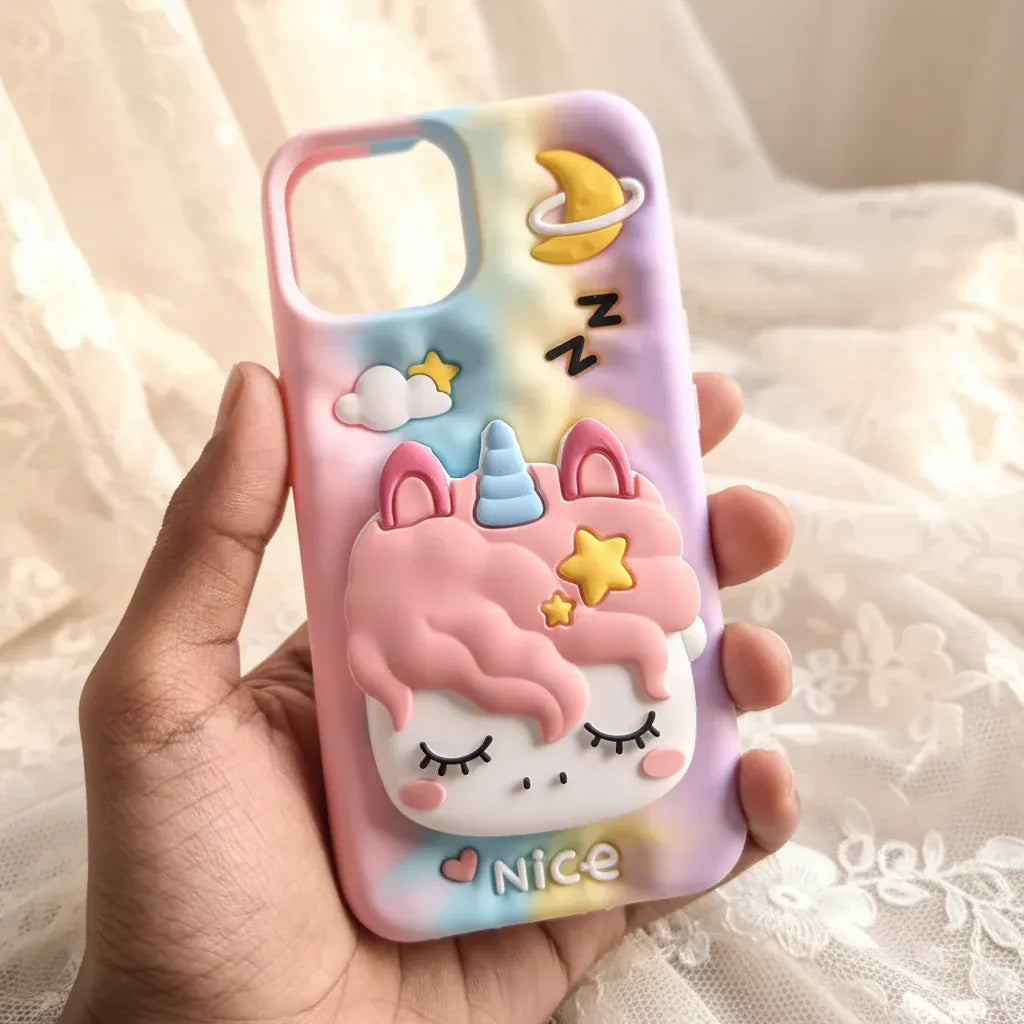 Phone case with unicorn design held by a hand outdoors