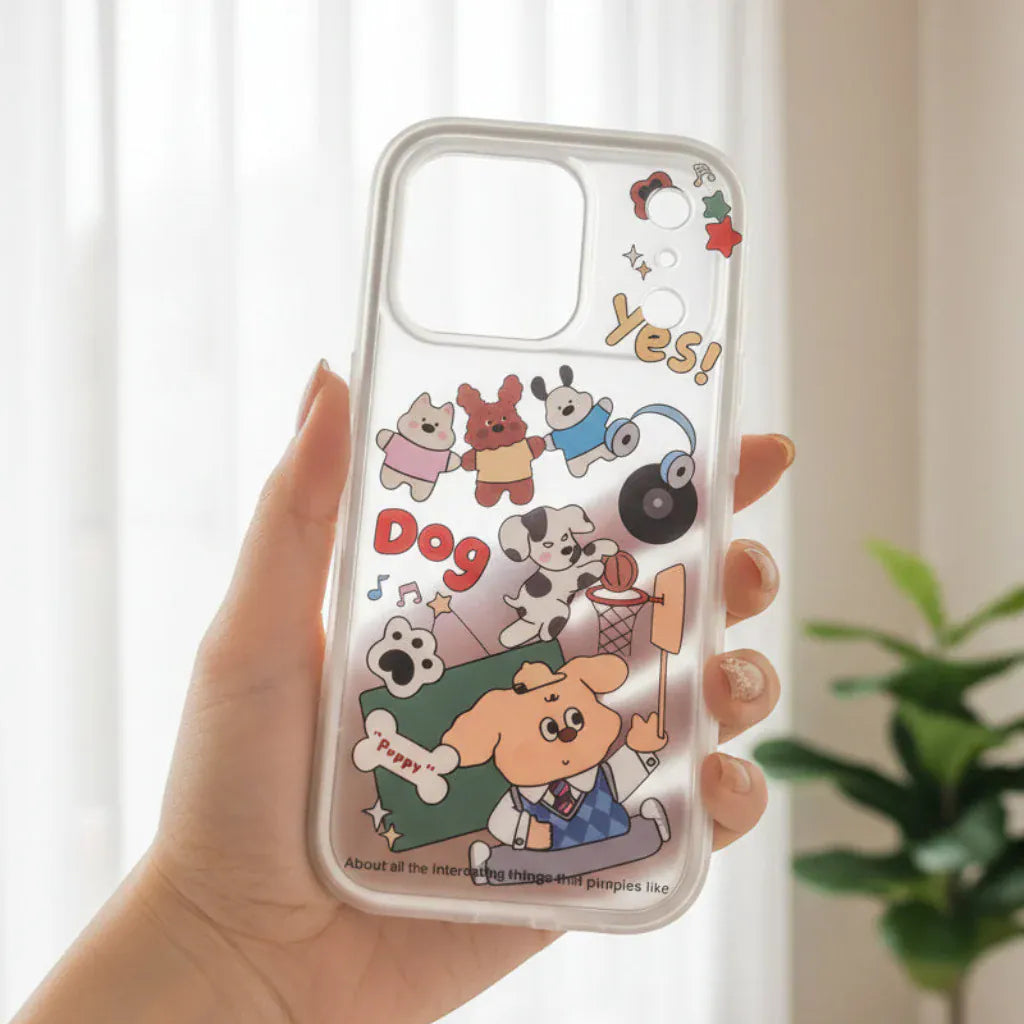 Phone case with cartoon characters held by a person outdoors